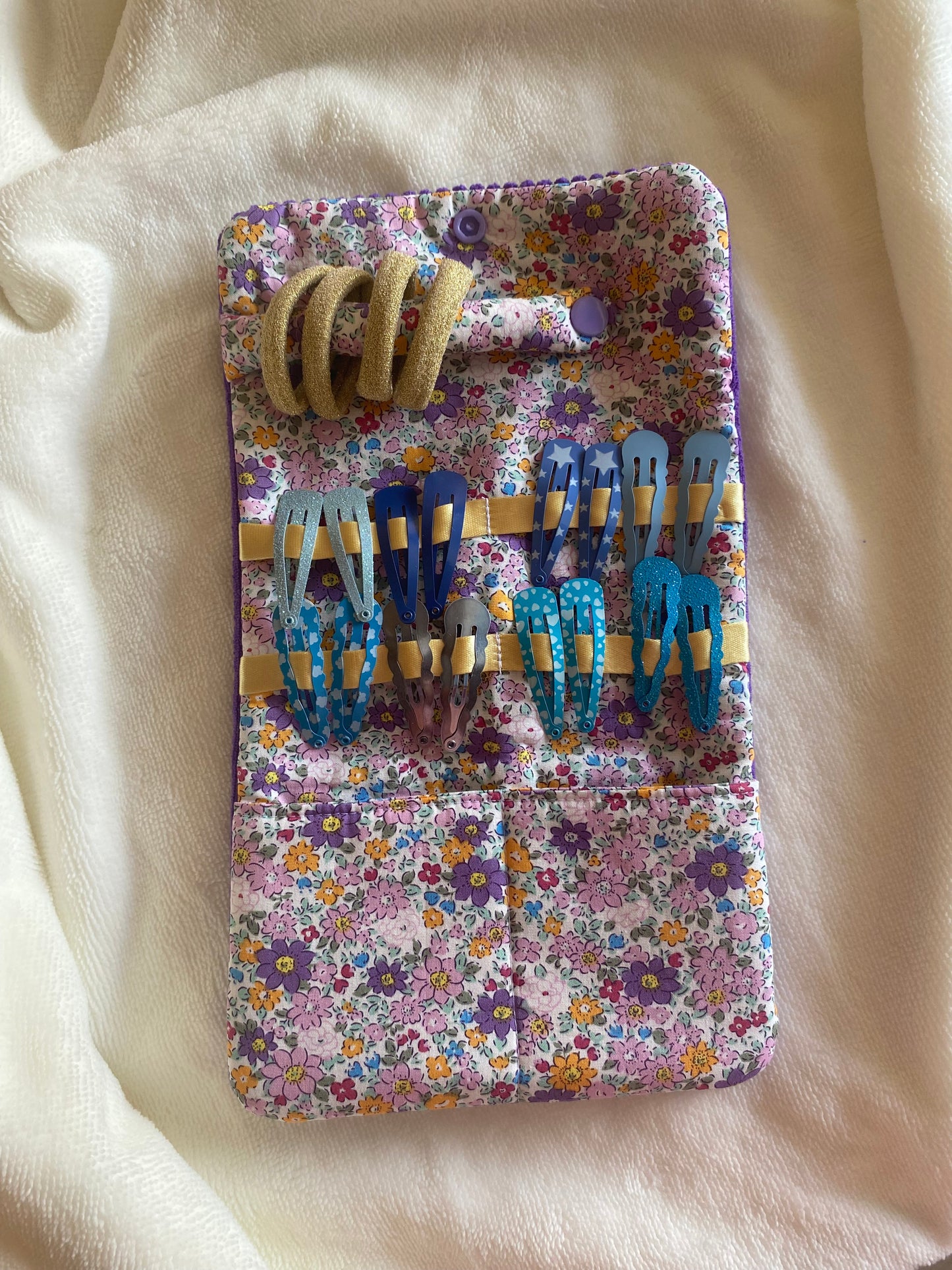Pochette à barrettes